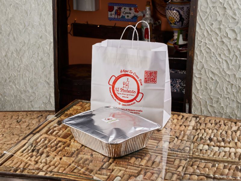 Spanish catering Miami Lakes takeout bag and aluminum tray from El Pimiento Restaurant